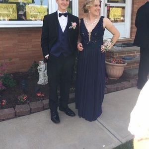 Sherri Hill navy prom dress with lace